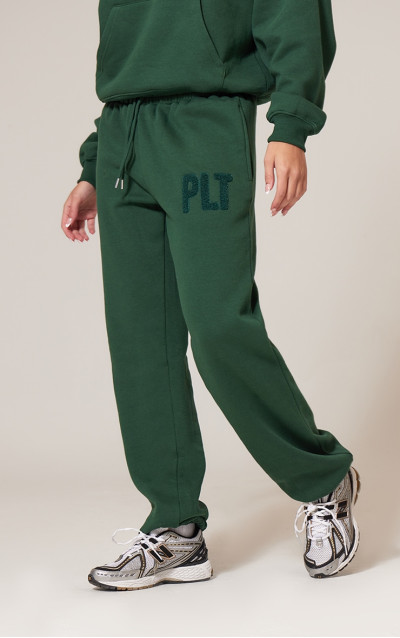Брюки для бігу з манжетами PRETTYLITTLETHING Forest Green Borg Applique