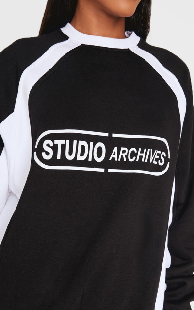 Чорний контрастний світшот Studio Archives