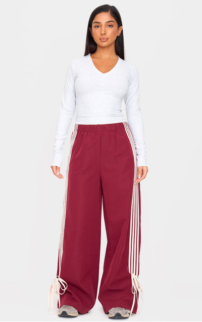 Мініатюрні бордові спортивні штани з бантом із черепашками