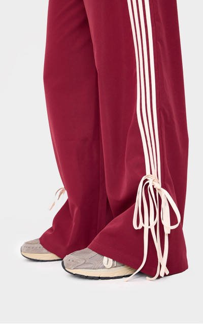 Мініатюрні бордові спортивні штани з бантом із черепашками