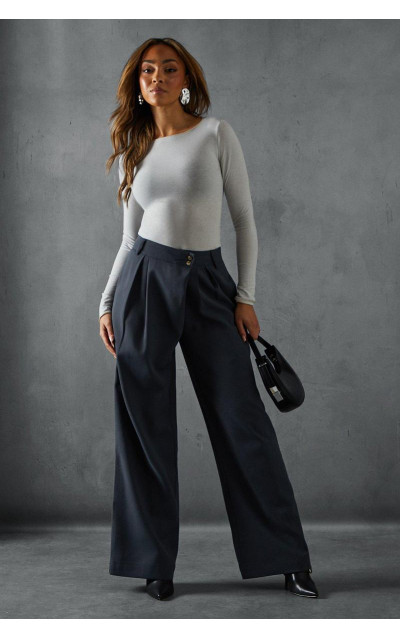 Широкі асиметричні штани з пояса