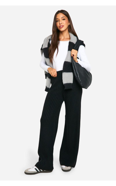 Широкі трикотажні брюки в рубчик