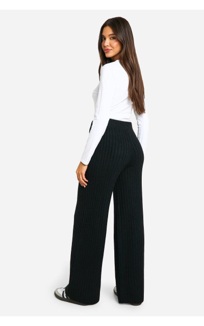 Широкі трикотажні брюки в рубчик