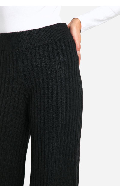 Широкі трикотажні брюки в рубчик