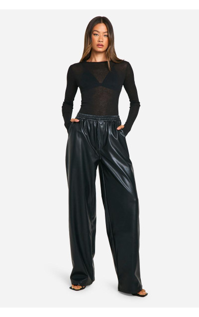 Високі широкі штани зі штучної шкіри на шнурках
