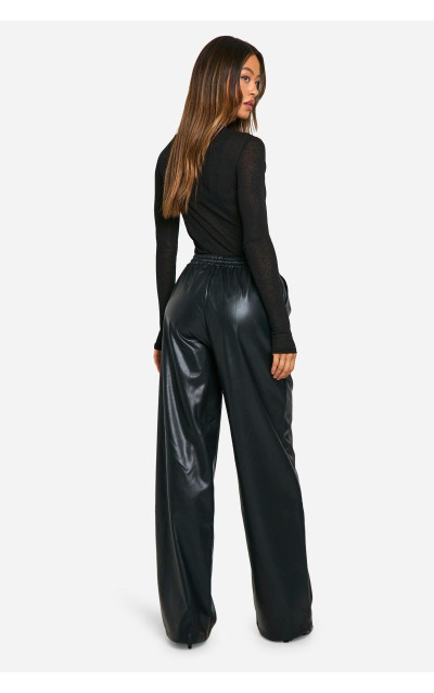 Високі широкі штани зі штучної шкіри на шнурках