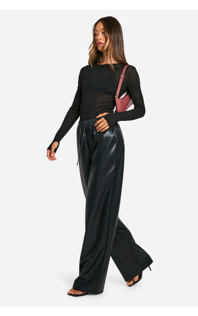 Високі широкі штани зі штучної шкіри на шнурках