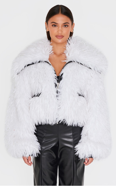 Кремова куртка на блискавці з кучерявим штучним хутром і контрастною обробкою з поліуретану